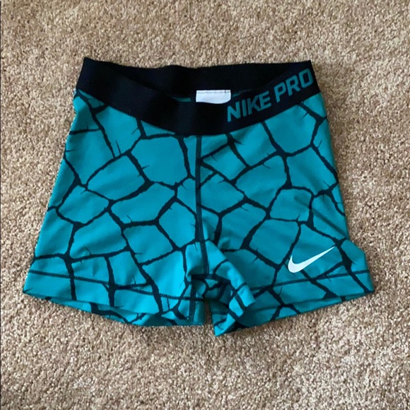 teal nike pros